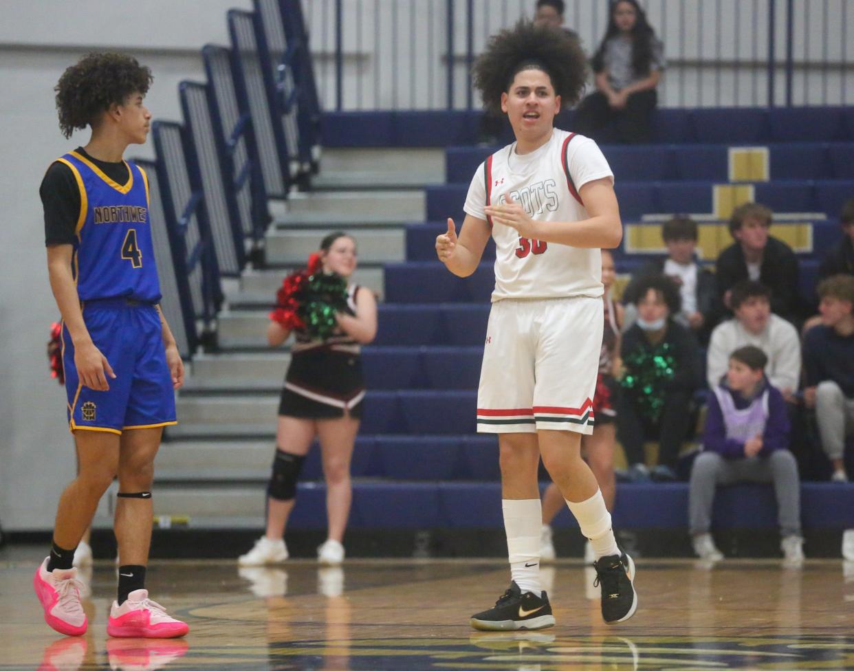 Highland Park's Tamir Anderson celebrates against Wichita Northwest in the championship game of the Topeka Invitational Tournament on Saturday, Jan. 20. Wichita Northwest defeated the Scots 64-61.