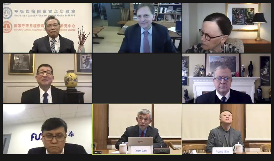 In this image from a video conference and released by Brookings Institution and Tsinghua University, participants take part in a seminar Monday, March 1, 2021 hosted by the Brookings Institution in Washington and Tsinghua University in Beijing between top U.S. and Chinese medical experts. China is lagging in its current vaccination rollout, but will aim to vaccinate 40% of its population by June, the head of a government expert team said during the conference. (Brookings Institution and Tsinghua University via AP)