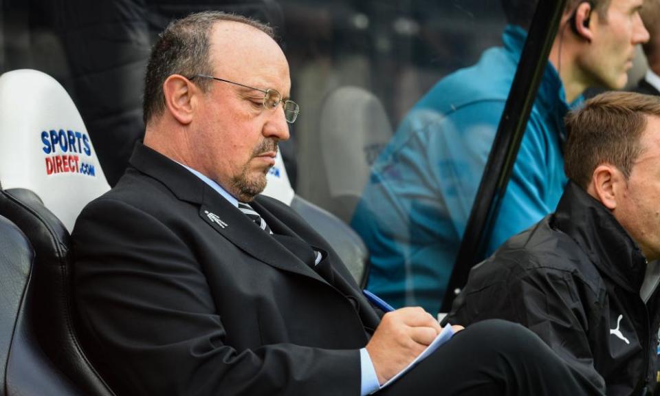 Rafael Benitez takes notes during last week’s defeat by Arsenal