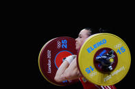 LONDON, ENGLAND - JULY 29: Iulia Paratova of Ukraine competes in the Women's 53kg Weightlifting on Day 2 of the London 2012 Olympic Games at ExCeL on July 29, 2012 in London, England. (Photo by Laurence Griffiths/Getty Images)