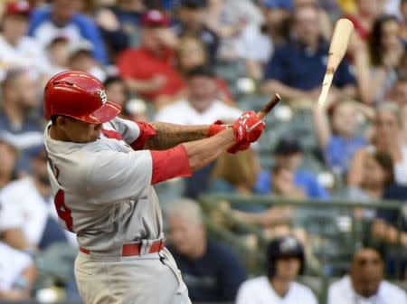 Jun 23, 2018; Milwaukee, WI, USA; St. Louis Cardinals shortstop Yairo Munoz (34) breaks his bat while popping out in the ninth inning during the game against the Milwaukee Brewers at Miller Park. Mandatory Credit: Benny Sieu-USA TODAY Sports