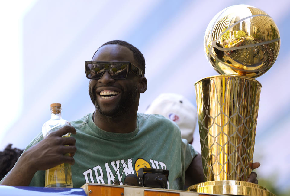 SAN FRANCISCO, CALIFORNIA - JUNE 20: Draymond Green #23 of the Golden State Warriors celebrates with the NBA Championship Trophy during the Golden State Warriors Victory Parade on June 20, 2022 in San Francisco, California. The Golden State Warriors beat the Boston Celtics 4-2 to win the 2022 NBA Finals. NOTE TO USER: User expressly acknowledges and agrees that, by downloading and or using this photograph, User is consenting to the terms and conditions of the Getty Images License Agreement. (Photo by Thearon W. Henderson/Getty Images)(Photo by Thearon W. Henderson/Getty Images)