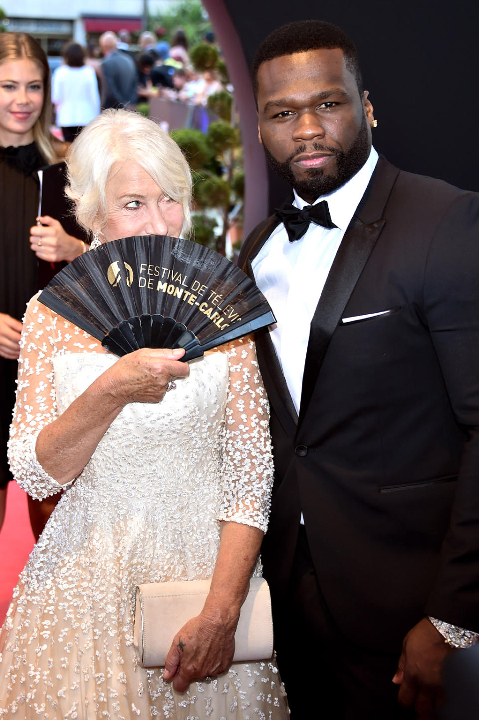 <p>Mirren, 71, couldn’t help but flirt with 50 — aka 41-year-old Curtis Jackson — at the closing ceremony of the 57th Monte Carlo TV Festival in Monaco. He didn’t seem to mind! (Photo: Stephane Cardinale – Corbis/Corbis via Getty Images) </p>