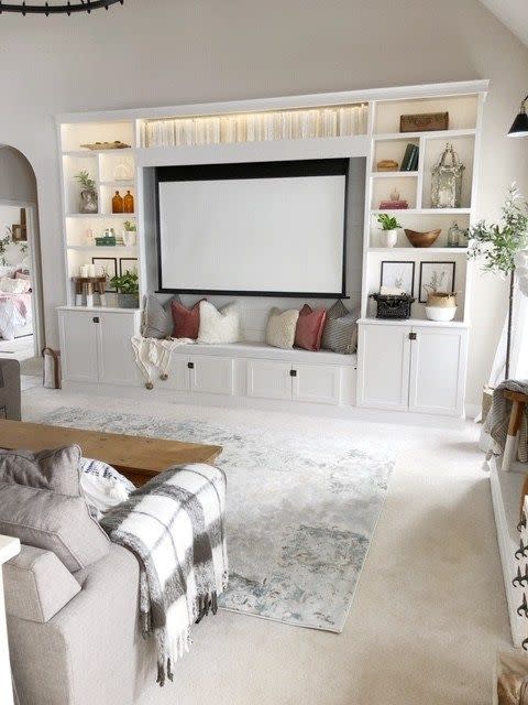 <p>Because movie nights and video games are just more fun on the big screen, set up your own projector. </p><p><em>See more at <a href="https://livingwithlady.com/2019/02/our-diy-built-ins-our-best-tips-and-tricks-to-build-your-own.html" rel="nofollow noopener" target="_blank" data-ylk="slk:Living With Lady;elm:context_link;itc:0;sec:content-canvas" class="link ">Living With Lady</a>. </em></p>