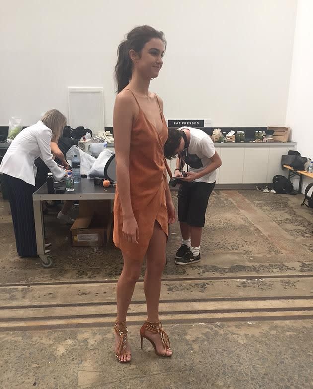 A model poses backstage at the Bec & Bridge show.