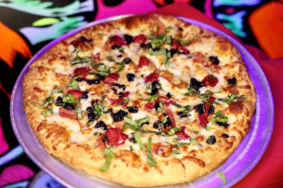 Nice Guys just added food, including a few pizzas, to its happy hour menu in Cape Coral.