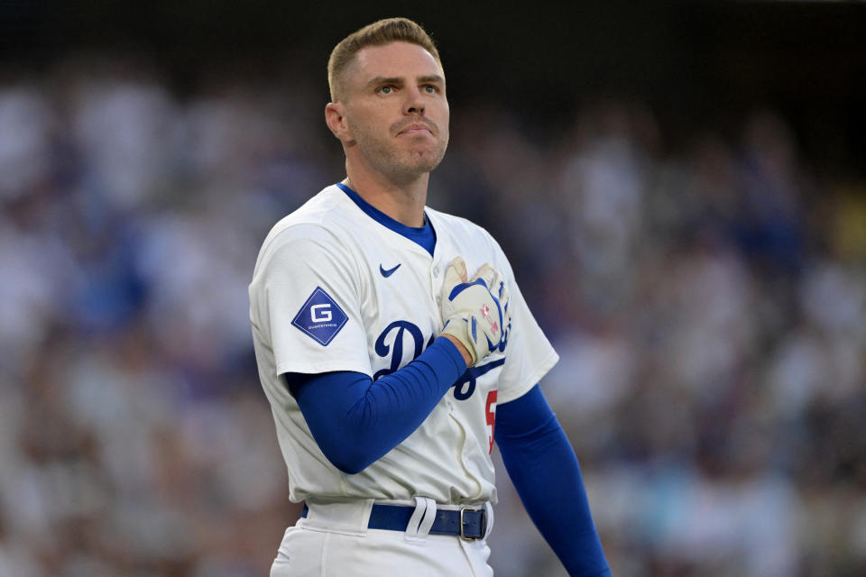 August 5, 2024;  Los Angeles, California, USA;  Los Angeles Dodgers first baseman Freddie Freeman (5) thanked the crowd as he received a standing ovation as he approached the plate for his first at-bat against the Philadelphia Phillies at Dodger Stadium.  Mandatory Credit: Jayne Kamin-Oncea-USA TODAY Sports