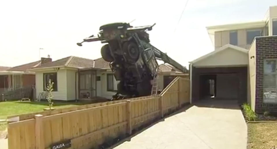 The crane shocked the mother and baby when it crashed through the roof (pictured). Source: 7News