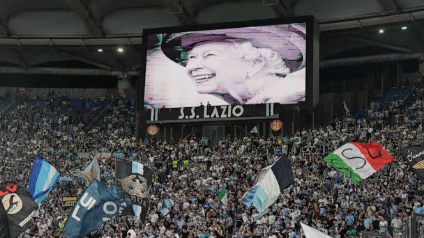 PHOTO: A portrait of Britain's  Queen Elizabeth is displayed on a giant screen following the announcement of her death at the Olympic stadium in Rome, Sept. 8, 2022. (Vincenzo Pinto/AFP via Getty Images)