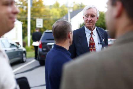 U.S. Senate candidate Jim Rubens (R-NH) speaks with local citizens before a town meeting in Windham, New Hampshire, August 5, 2014. Picture taken August 5, 2014. REUTERS/Dominick Reuter