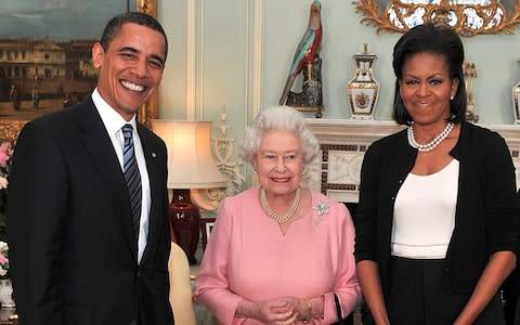 Barack and Michelle Obama with the Queen  - Credit: PA