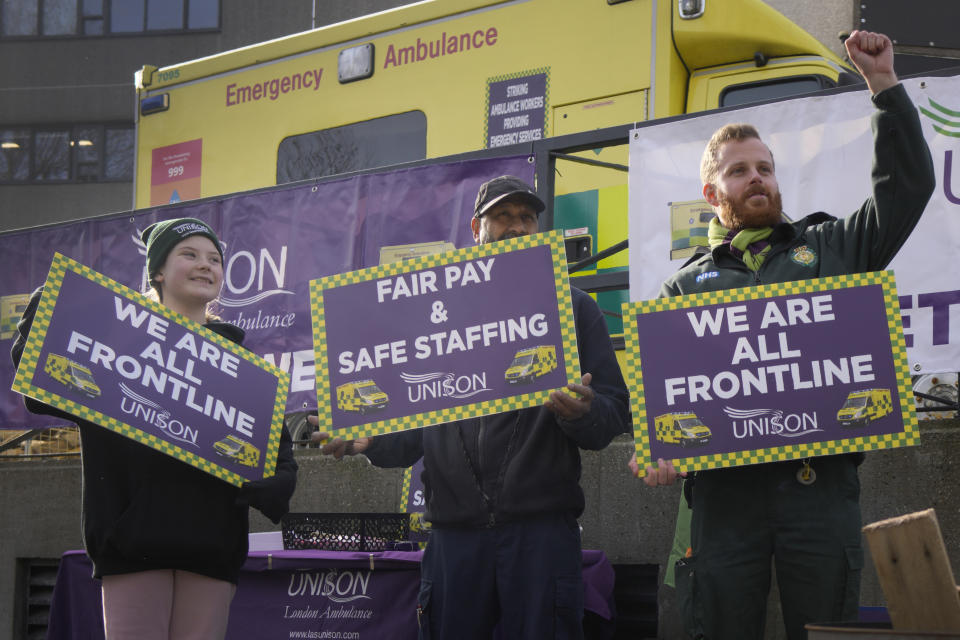 Ambulance workers stand on a picket line during a strike by members of the Unison union in the long-running dispute over pay and staffing, in London, Friday, Feb. 10, 2023.(AP Photo/Kirsty Wigglesworth)