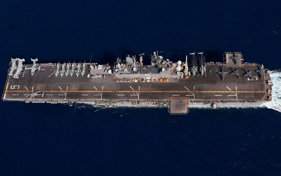 USS Bataan in the Red Sea last summer. Note Marine tiltrotors, helicopters and Harrier jump jets on deck