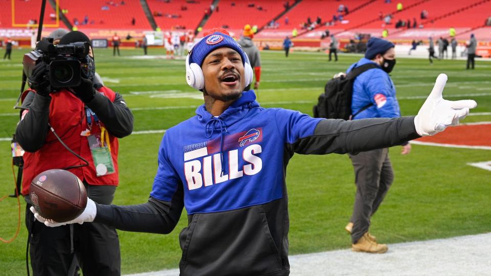 Mandatory Credit: Photo by Reed Hoffmann/AP/Shutterstock (11724256bp)Buffalo Bills wide receiver Stefon Diggs throws the back back and forth with Bills fans during pre-game activities before the NFL AFC championship football game between the Kansas City Chiefs and the Buffalo Bills, in Kansas City, MoBills Chiefs Football, Kansas City, United States - 24 Jan 2021.