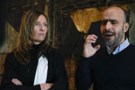 Dutch-Palestinian Ismail Ziada, right, and his lawyer Liesbeth Zegveld, left, are interviewed after a Dutch appeals court in The Hague Tuesday, Dec. 7, 2021, upheld a lower court's decision to throw out a civil case against Israel's defense minister and another former senior military officer over their roles in a deadly 2014 airstrike in Gaza which killed six members of the Ziada family. (AP Photo/Peter Dejong)