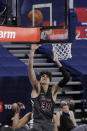 Santa Clara forward Guglielmo Caruso shoots during the first half of an NCAA college basketball game against Gonzaga in Spokane, Wash., Thursday, Feb. 25, 2021. (AP Photo/Young Kwak)