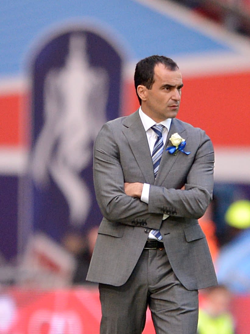 Wigan Athletic manager Roberto Martinez looks on from the touchline