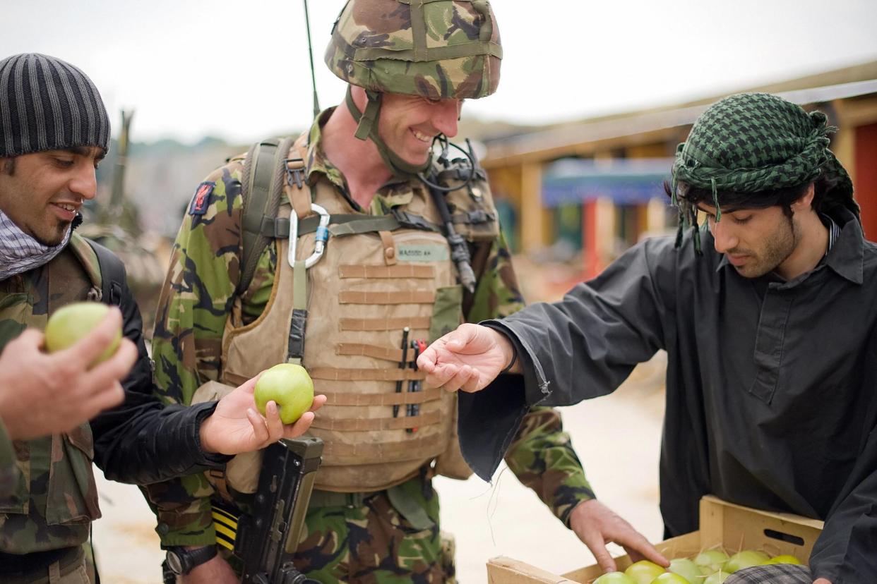 Making sense: A British soldier with an interpreter (Photo: Leon Neal/AFP/Getty Images): AFP/Getty Images