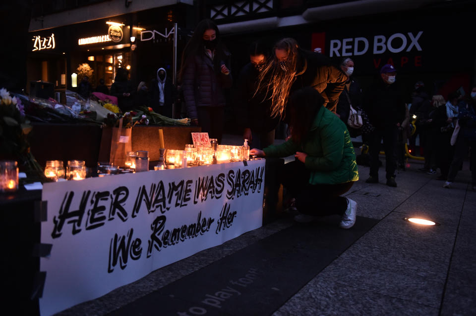 NOTTINGHAM, ENGLAND - MARCH 13: People light candles during a vigil for Sarah Everard on March 13, 2021 in Nottingham, England. Vigils are being held across the United Kingdom in memory of Sarah Everard. Yesterday, the Police confirmed that the remains of Ms Everard were found in a woodland area in Ashford, a week after she went missing as she walked home from visiting a friend in Clapham. Metropolitan Police Officer Wayne Couzens has been charged with her kidnap and murder. (Photo by Nathan Stirk/Getty Images