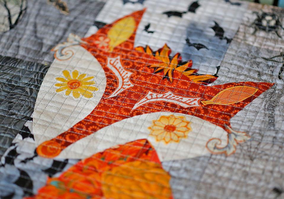 Details of a Halloween quilt by Holly Carpenter, of Marshfield.