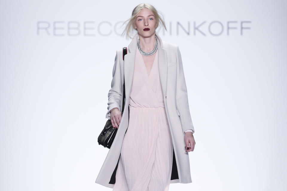 The Rebecca Minkoff Fall 2014 collection is modeled during Fashion Week, Friday, Feb. 7, 2014, in New York. (AP Photo/John Minchillo)