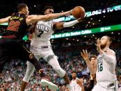 May 23, 2018; Boston, MA, USA; Cleveland Cavaliers forward Larry Nance Jr. (22) blocks a shot from Boston Celtics guard Jaylen Brown (7) in front of center Aron Baynes (46) during the fourth quarter of Boston's 96-83 win over the Cleveland Cavaliers in game five of the Eastern conference finals of the 2018 NBA Playoffs at TD Garden. Mandatory Credit: Winslow Townson-USA TODAY Sports