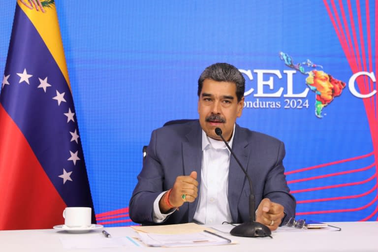 A handout picture released by the Venezuelan authorities shows President Nicolas Maduro speaking during a virtual summit of the Community of Latin American and Caribbean States (MARCELO GARCIA)