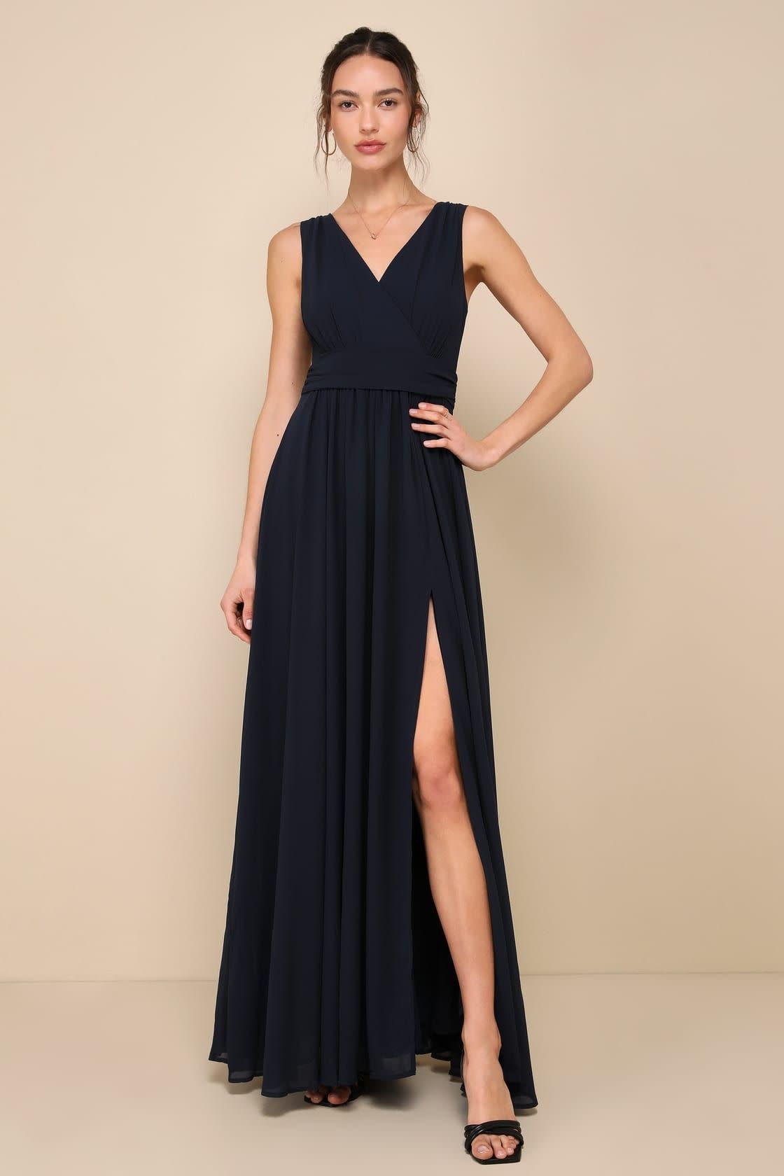 <p><a href="https://go.redirectingat.com?id=74968X1596630&url=https%3A%2F%2Fwww.lulus.com%2Fproducts%2Fthoughts-of-hue-navy-blue-surplice-maxi-dress%2F647452.html&sref=https%3A%2F%2Fwww.thepioneerwoman.com%2Ffashion-style%2Fg43231815%2Fspring-wedding-guest-dresses%2F" rel="nofollow noopener" target="_blank" data-ylk="slk:Shop Now;elm:context_link;itc:0;sec:content-canvas" class="link rapid-noclick-resp">Shop Now</a></p><p>Thoughts of Hue Surplice Maxi Dress</p><p>$98.00</p><span class="copyright">Lulus</span>