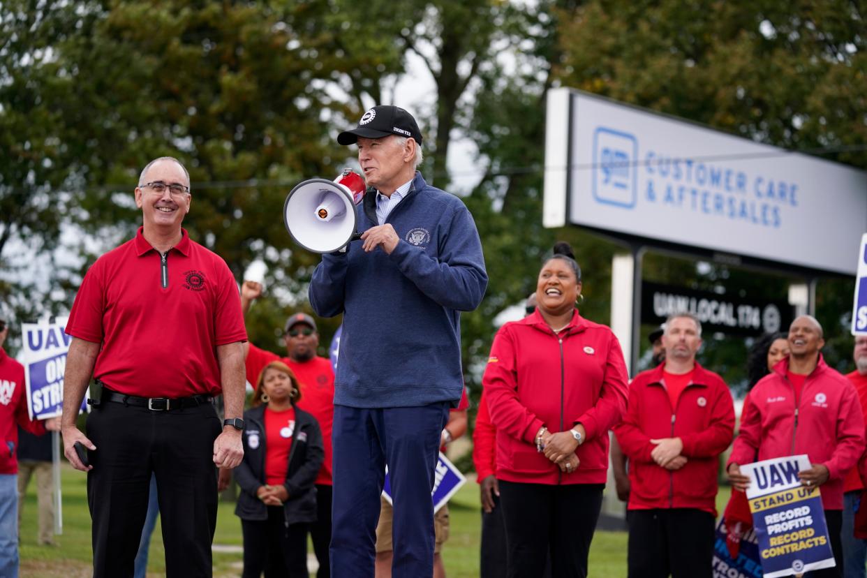 President Joe Biden joins striking United Auto Workers on the picket line, Tuesday, Sept. 26, 2023, in Van Buren Township, Mich. (AP Photo/Evan Vucci)