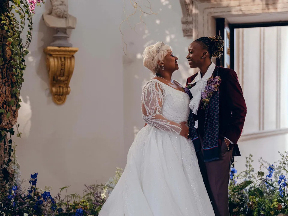 Tiffany Rae and Shanti Hinton posing at the wedding.