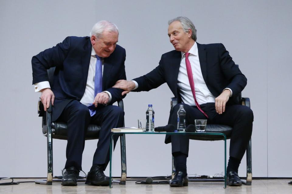 Former Taoiseach Bertie Ahern and former Prime Minister Tony Blair at an event to mark the 20th anniversary of the Good Friday Agreement, at Queen’s University in Belfast, in 2018 (PA Wire)