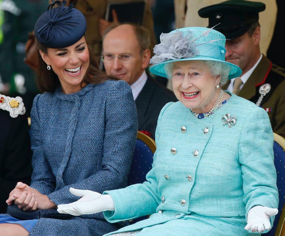 NOTTINGHAM, ENGLAND - JUNE 13: Catherine, Duchess of Cambridge and Queen Elizabeth II watch part of a children's sports event while visiting Vernon Park during a Diamond Jubilee visit to Nottingham on June 13, 2012 in Nottingham, England. (Photo by Phil Noble - WPA Pool/Getty Images)