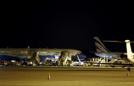 An aircraft of the United States of America stands next to a Iranian government aircraft at Geneva airport in Switzerland January 16, 2016. REUTERS/Denis Balibouse