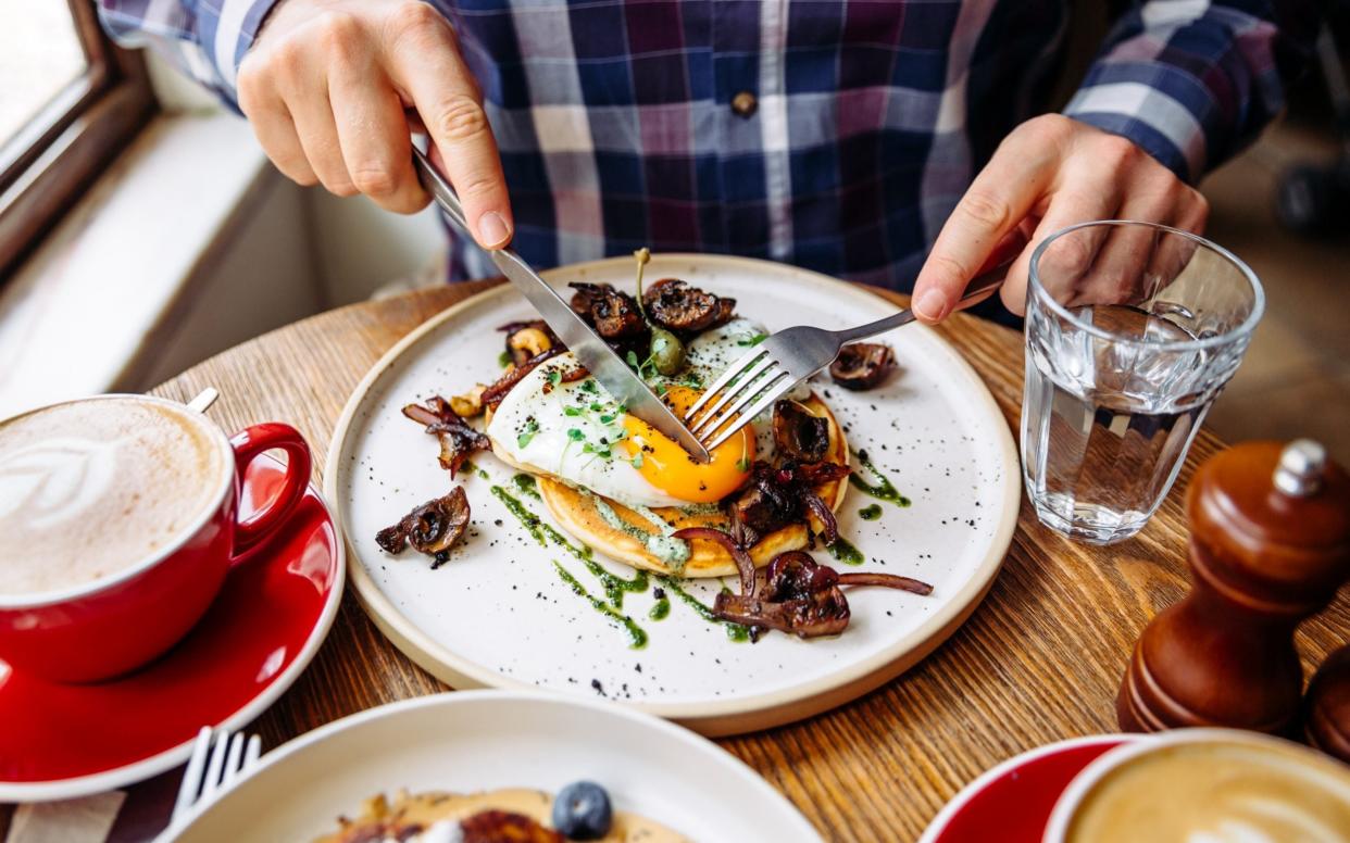 Eat up: Dining at 6pm means you can be home well before the 10pm curfew - Getty Images 