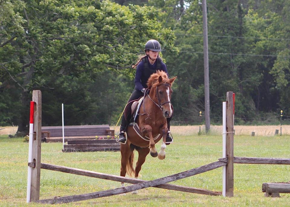 Sophia Gallivan and Misty’s Red Dawn, a Chincoteague pony, compete in the discipline of eventing.