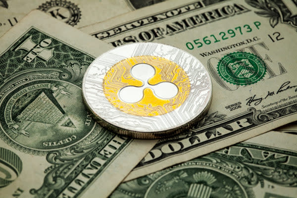 ripple-xrp-coin-on-us-dollar-bills