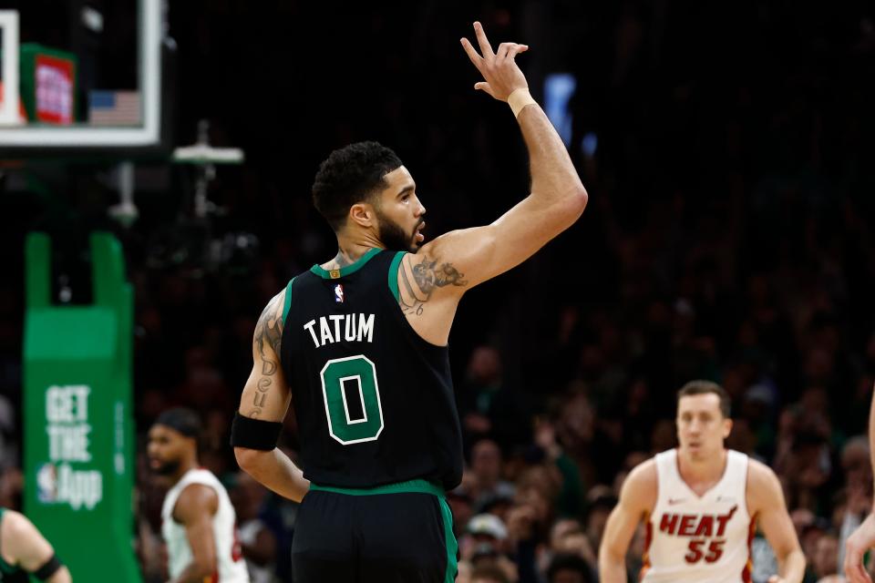 May 1, 2024; Boston, Massachusetts, USA; Boston Celtics forward Jayson Tatum (0) celebrates a three point basket against the Miami Heat during the first quarter of game five of the first round of the 2024 NBA playoffs at TD Garden. Mandatory Credit: Winslow Townson-USA TODAY Sports