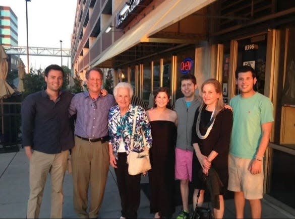 The Altman family with parents Jerry Altman (second from left) and Connie Gibstine (second from right)