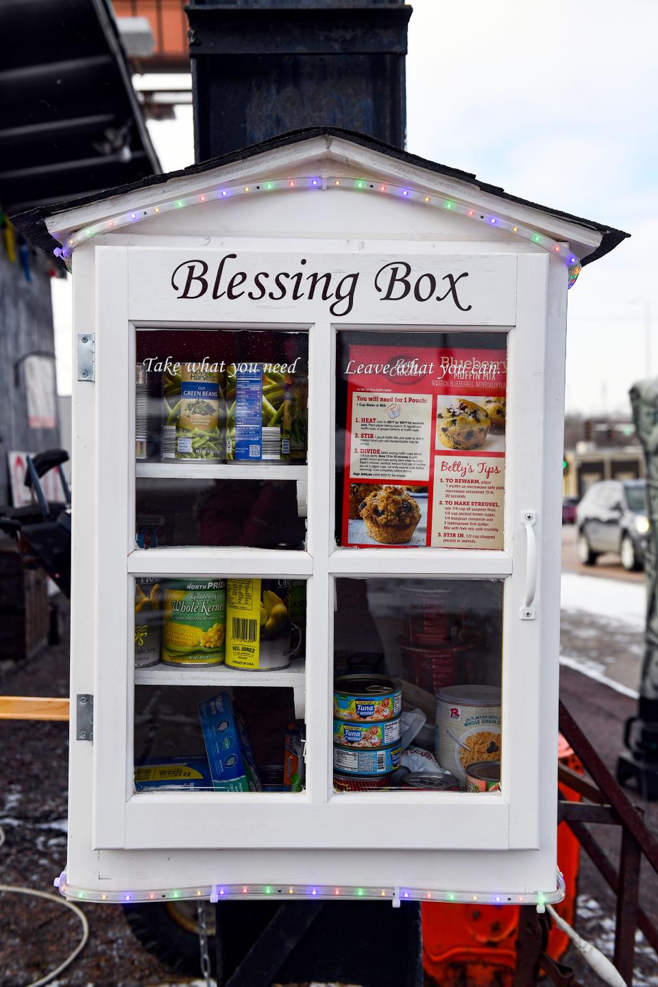 The Blessing Box, an anonymous food donation station, sits full of non-perishable goods on Saturday, December 18, 2021 at their antique shop, Booth 202, in Sioux Falls. Owner Steve Whitman said he has received nearly daily donations, which keeps up with the fact that the box is emptied most nights.