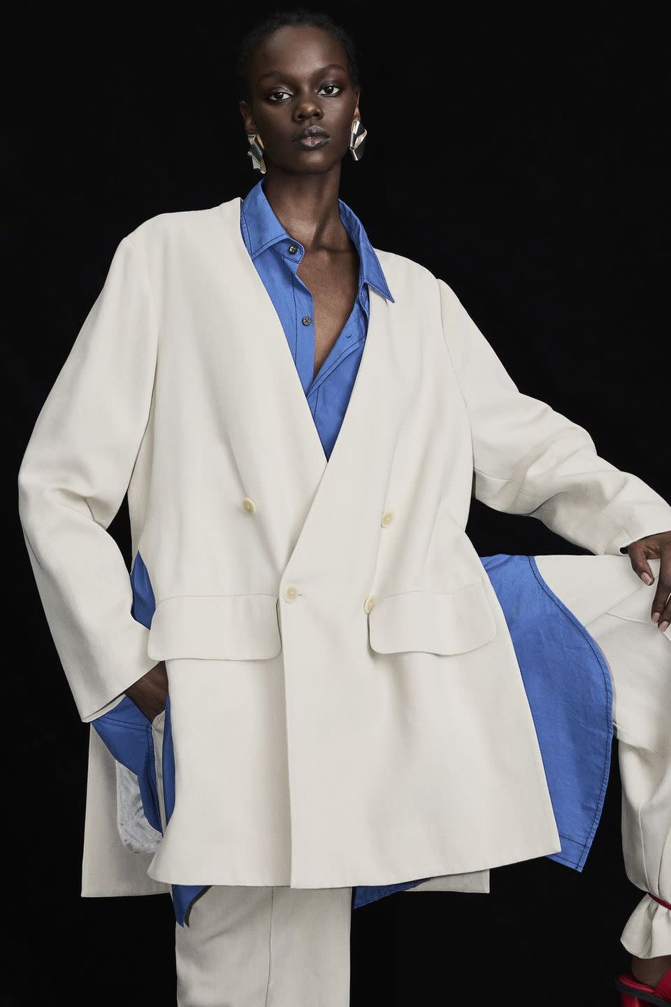 a person wearing a white coat