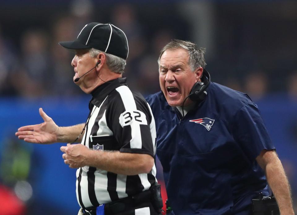 New England Patriots coach Bill Belichick argues with an official against the Los Angeles Rams in the fourth quarter in Super Bowl LIII on Feb. 3, 2019.