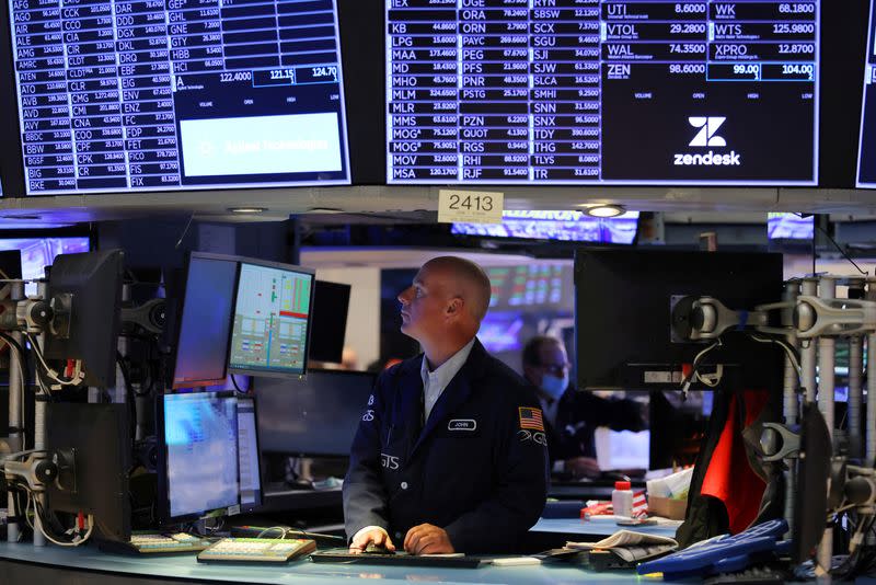 A trader works on the trading floor at the New York Stock Exchange (NYSE) in Manhattan, New York City