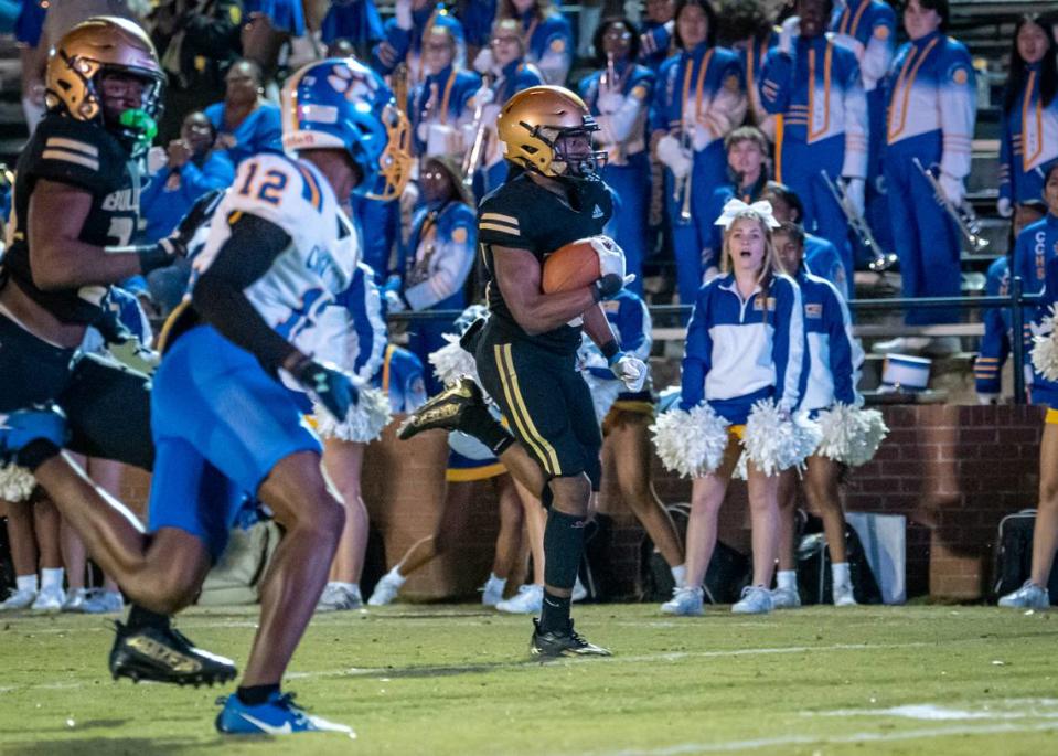 Senior Jacobi Jones (24) notches a pick six for Mary Persons against Crisp County in the second round of the GHSA Class AAA football playoffs.