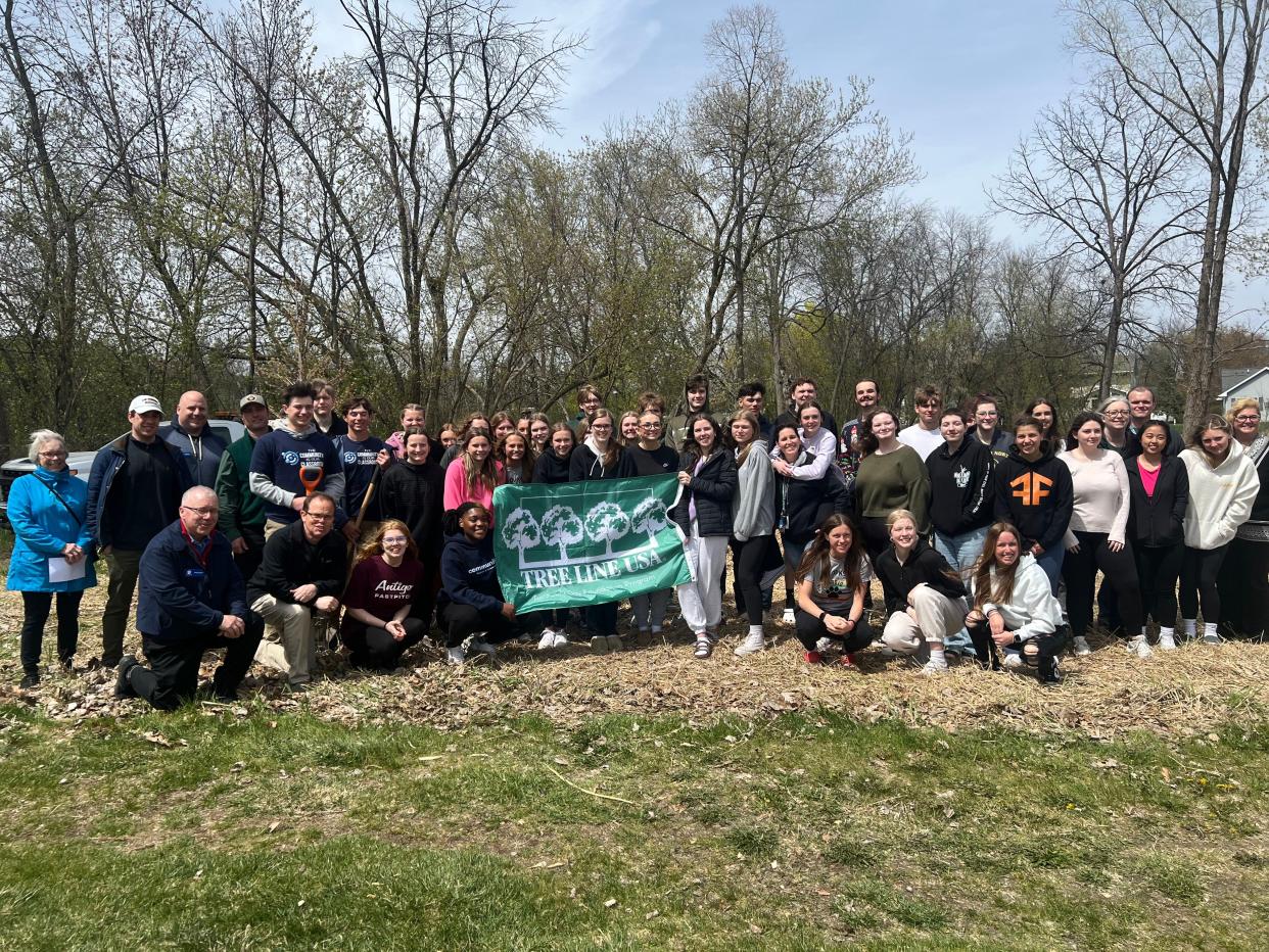 In celebration of Arbor Day, Oshkosh North High School’s Communities Program planted three trees in the park behind the school on April 26.