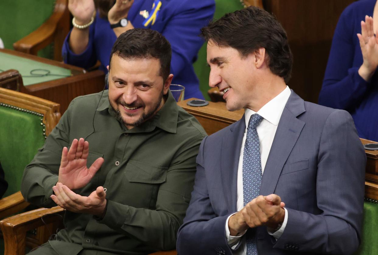 Justin Trudeau and Volodymyr Zelenskyy pictured  together in the Canadian Parliament on Friday (AP)