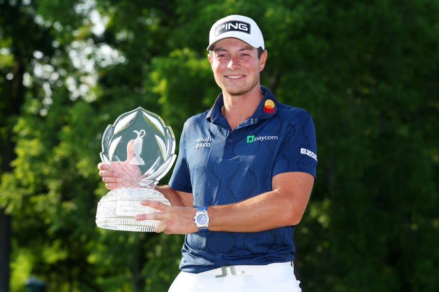 DUBLIN, OHIO – JUNE 04: Viktor Hovland of Norway poses with the trophy after winning the Memorial Tournament presented by Workday in a playoff over Denny McCarthy of the United States at Muirfield Village Golf Club on June 04, 2023 in Dublin, Ohio. (Photo by Michael Reaves/Getty Images)