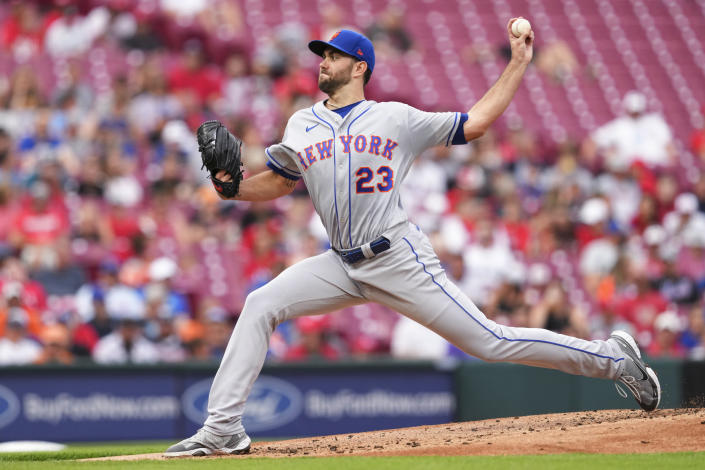 New York Mets starting pitcher David Peterson throws during the first inning of the team's baseball game against the Cincinnati Reds on Wednesday, July 6, 2022, in Cincinnati. (AP Photo/Jeff Dean)