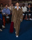 The Tommy Hilfiger collection is modeled during Fashion Week, Friday, Feb. 9, 2024, in New York. (AP Photo/Peter K. Afriyie)