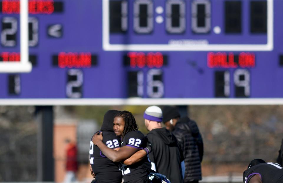 Mount Union players Landon Jenkins and Jerry Cooper after a second round lose to Alma in NCAA Division III playoff at Mount Union. Saturday, November 25, 2023.