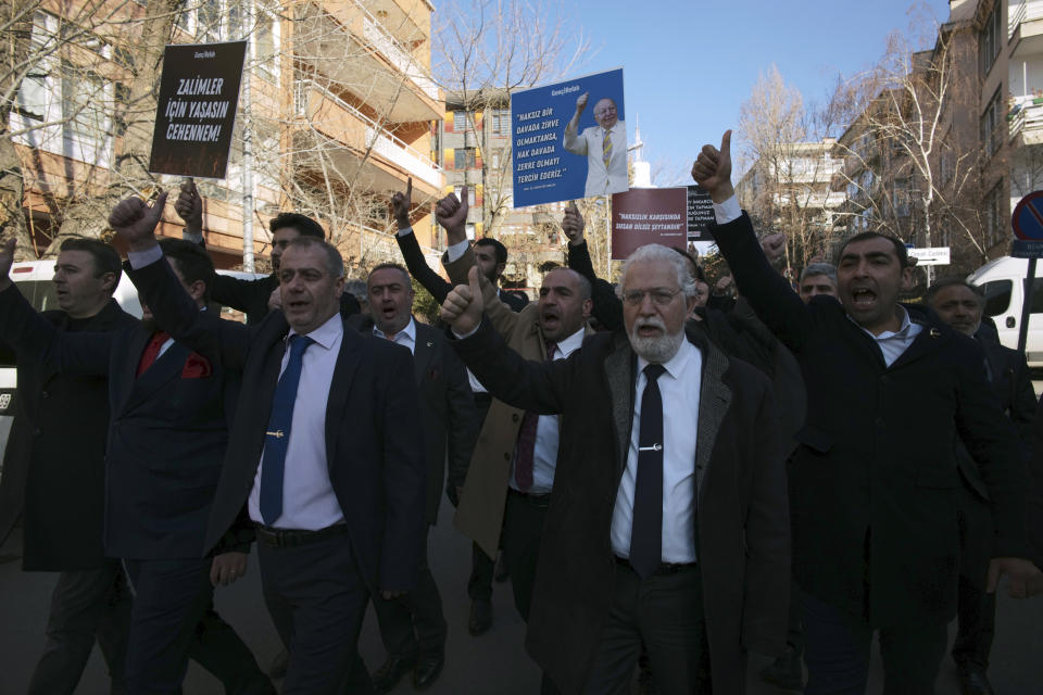 Protesters chant slogans during a demonstration outside the Swedish embassy in Ankara, Turkey, Saturday, Jan. 21, 2023. Far-right activist Rasmus Paludan has received permission from police to stage a protest outside the Turkish Embassy in Stockholm, where he intends to burn the Quran, Islam's holy book. (AP Photo/Burhan Ozbilici)